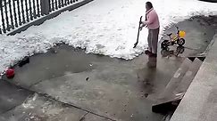 Women knocked while cleaning snow in yard