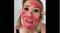 Woman wearing black contacts starts painting face red then transitions to full special effects makeup look