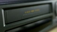 Inserting Vhs Tape Into Vcr Player Stock Footage Video (100% Royalty-free) 16009627 | Shutterstock