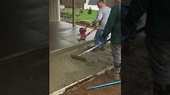 Pouring concrete with a power screed