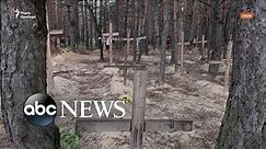 Mass grave site found in recaptured Ukraine city l WNT