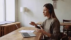 Woman Headphones Hold Online Conference Client Stock Footage Video (100% Royalty-free) 1105424369 | Shutterstock