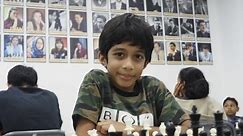 Boy, 8, Sets World Record Beating 37-Year-Old Chess Grand Master