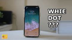 How to remove the white dot icon from the iPhone screen