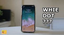How to remove the white dot icon from the iPhone screen