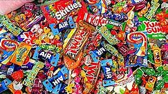 a Lot of Candy Unboxing Skittles, Twix, Skittles, KitKat, Lollipops And Many Other Chocolate Candy