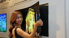 Want a paper-thin OLED TV that sticks on the wall with magnets? LG’s got it
