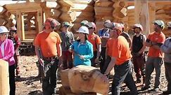 Christy Clark finishes wood carving at Pioneer Logs Homes