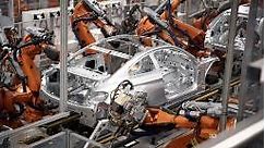 El ejército de robots de BMW que pueden construir 1.000 autos por día