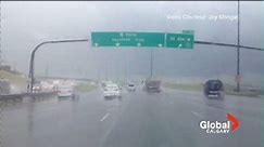 Watch storm rip apart highway sign