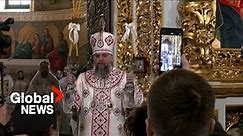 Ukrainian Orthodox patriarch condemns Russian war crimes at Christmas service in reclaimed church