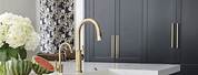 Black Painted Kitchen Cabinets with Brass Hardware