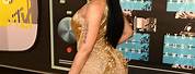 Nicki Minaj New Look On a Dress in Gold