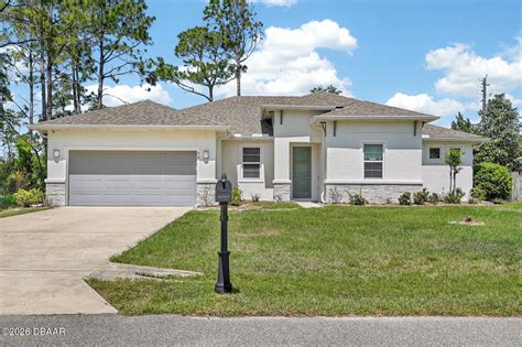 98 Bud Hollow Dr, For Sale in Palm Coast - eXp Realty