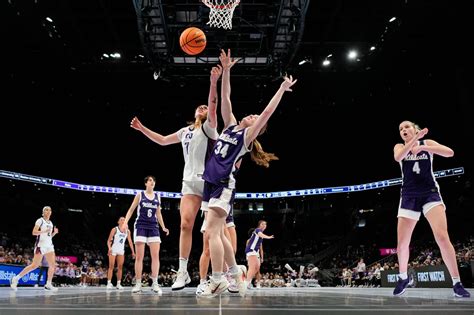 Harrison helps No. 15 West Virginia beat No. 10 TCU 62-53 for the women ...