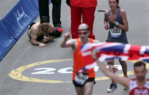 Former Marine Crawls Across Finish Line at Boston Marathon
