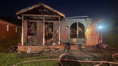 Investigation underway after fire tears through Nitro house