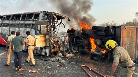 13 killed, over 20 injured after bus crashes into lorry, catches fire ...