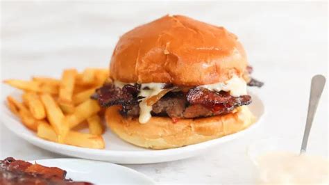 The Unexpected Boxed Ingredient That Makes Cheeseburgers 10X More Flavorful