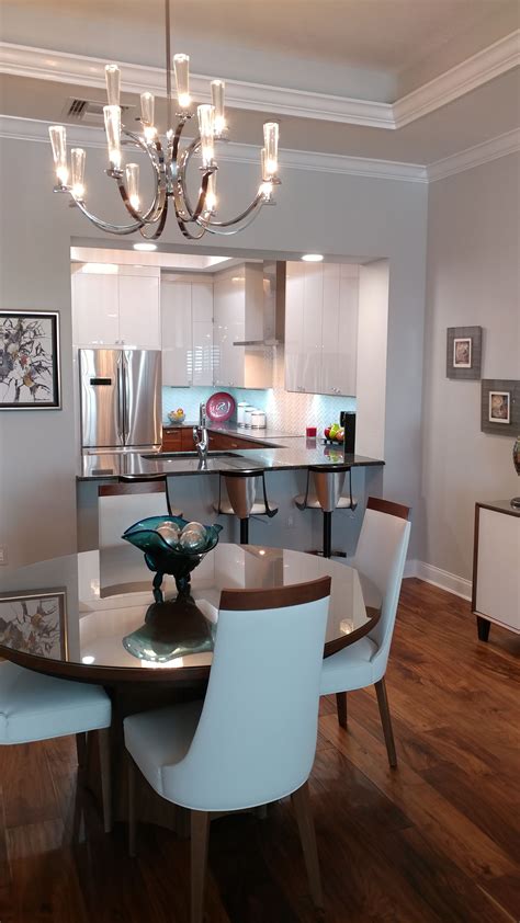 The glossy gray cabinets tie in beautifully with our clients' decor and ...