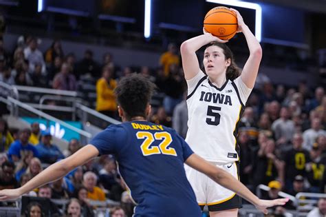 No. 9 Iowa beats No. 8 Michigan 59-42, advances to Big Ten title game ...