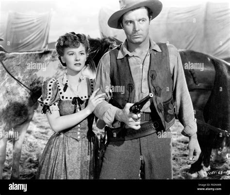 Men with guns movie Black and White Stock Photos & Images - Alamy
