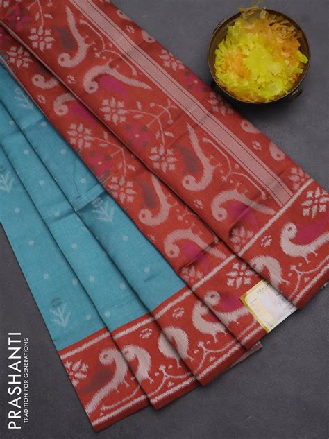 Semi sambalpuri silk saree teal blue and rustic orange with allover ik ...