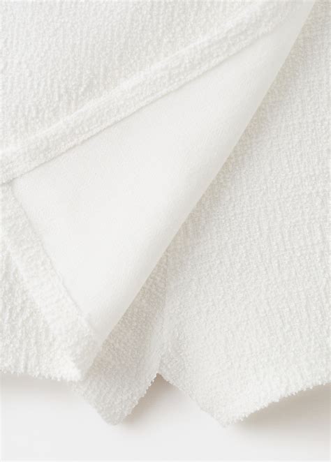 Knitted skirt and trousers - Kids | MANGO China