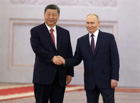 Watch: Putin Courts Xi With Full Pomp - Newsweek