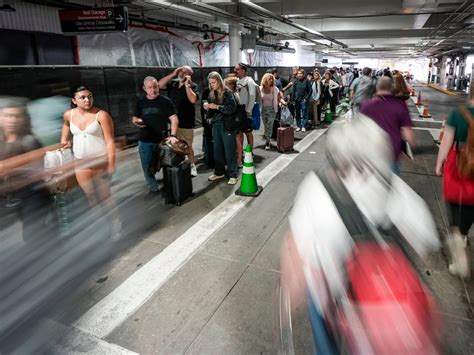 Photos show TSA lines clogging airports and snaking into parking ...