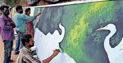 Artists turn wall into mesmerizing green forest in Wayanad's Mananthavady