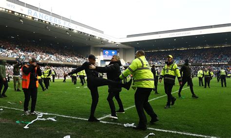 Police condemn 'shameful' scenes after pitch invasion at Celtic's ...