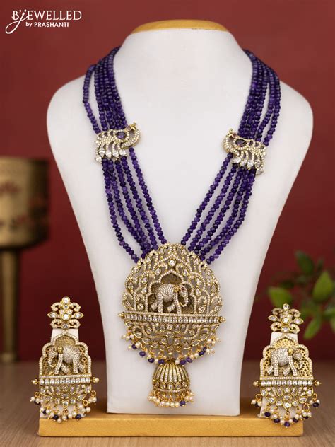 Beaded multilayer violet haram elephant pendant with cz stones and pea ...
