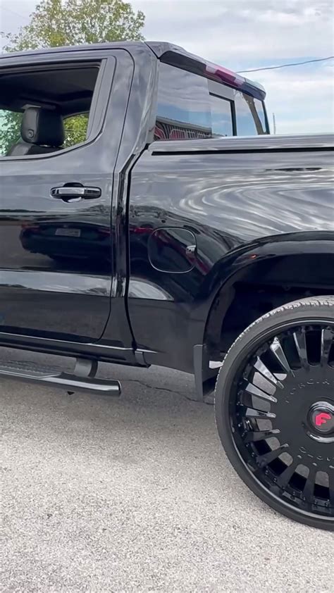 Black Chevy Silverado Z71 truck on 30’s Forgiatos