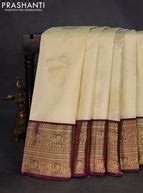 Pure kanchipuram silk saree cream and purple with zari woven buttas an ...