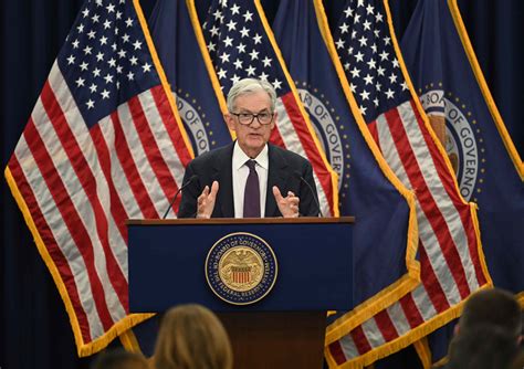 Fed holds interest rates steady amid rising inflation and slowing job market