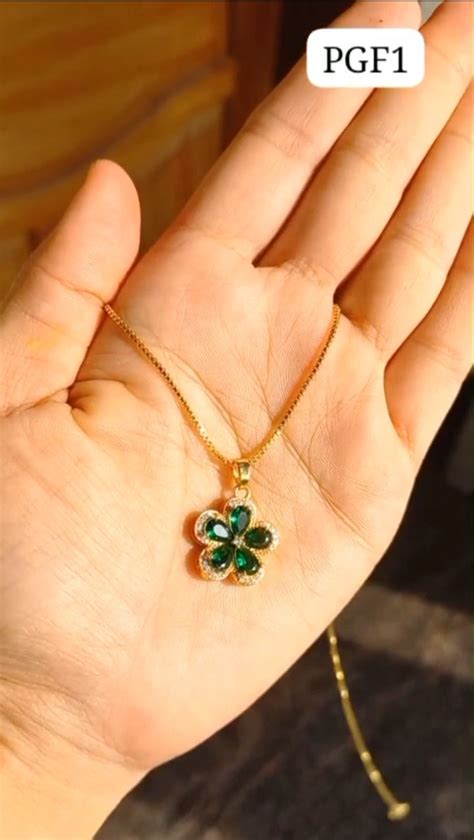 Daily wear premium gold plated American Diamond and green amethyst sto ...