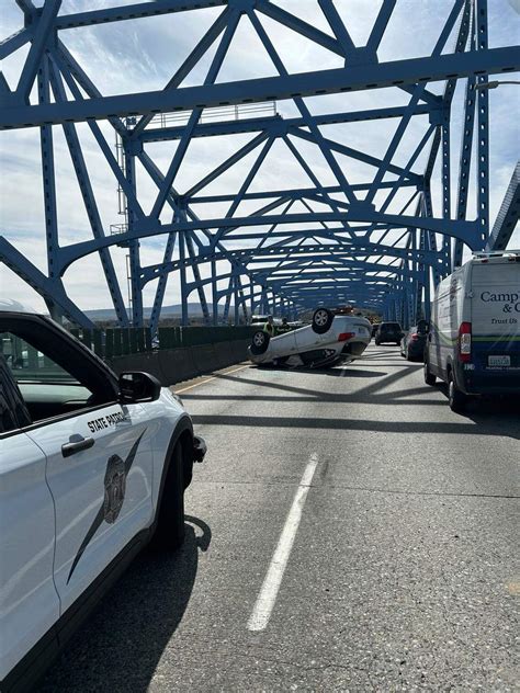 Drivers wouldn't let tow truck past after rollover crash on Blue Bridge