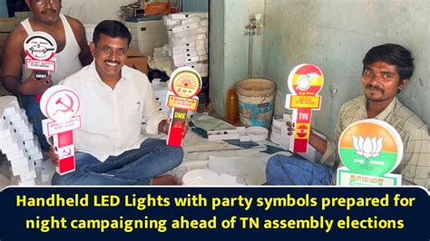 Handheld LED lights with party symbols prepared for night campaigning ahead of TN assembly elections
