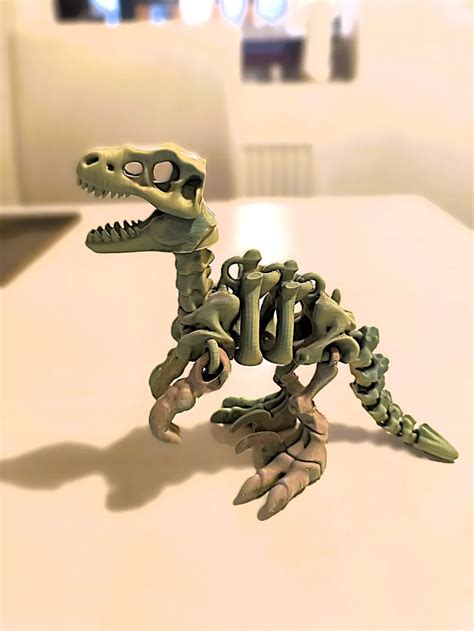 Articulated Velociraptor flexi dinosaur - Free 3D Print Model - MakerWorld