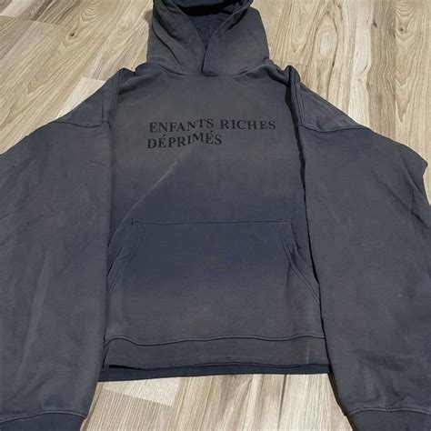 Black ERD hoodie with the words 'ENFANTS RICHES... | Depop