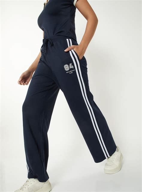 Buy Women Side Striped Wide-Leg Track Pants Online at just Rs. 799.0 ...