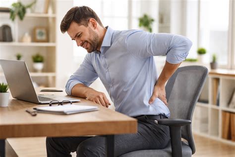 Why Does Lower Back Pain Get Worse After Sitting? Causes and Treatment Options