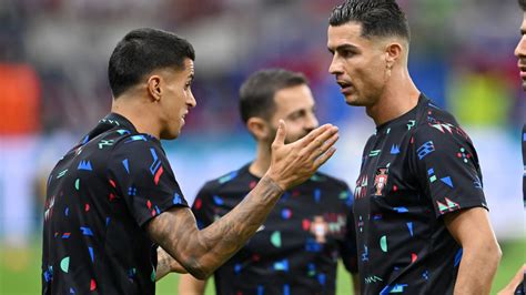 Cristiano Ronaldo and Portugal rocked as Joao Cancelo suffers knee injury for Barcelona just 50 ...