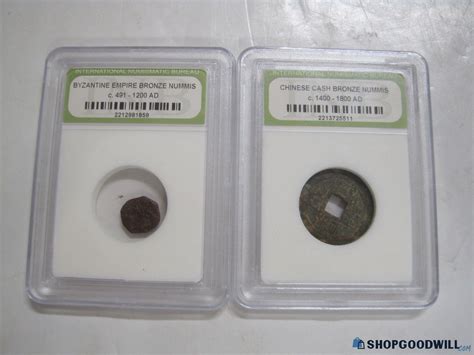 2 International Numismatic Bureau Bronze Nummis Coins - shopgoodwill.com