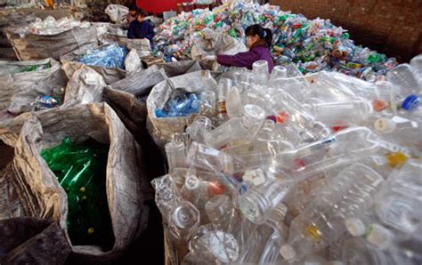 时代周刊：中国废品收购者感受经济危机(图)_威尼斯人网址|游戏官网