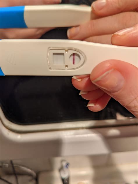No period -2 weeks late, neg HCG tests so took an opk because thought maybe I ovulated late that ...