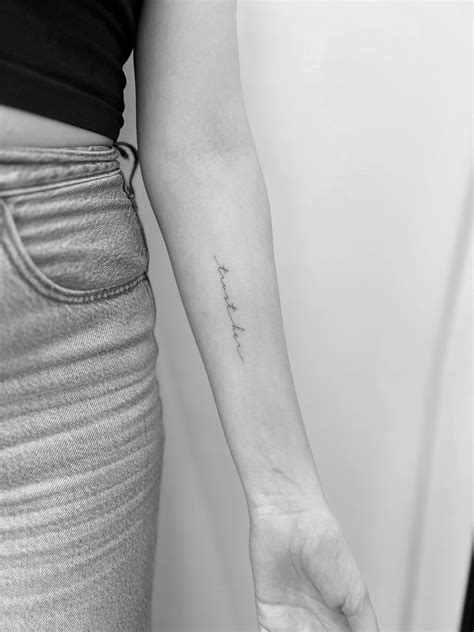 Script Arm Tattoo Women
