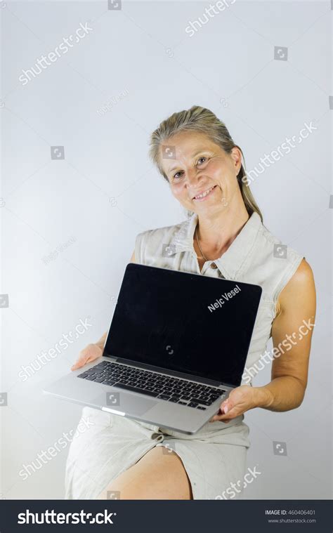 Woman Holding Computer Smiling Stock Photo 460406401 | Shutterstock