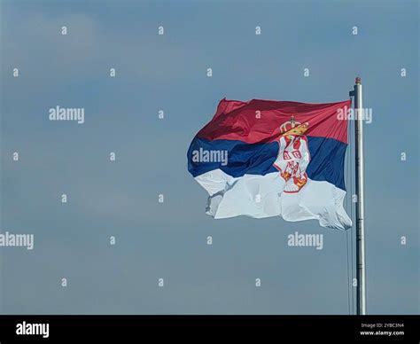 Serbian flag, Waving flag, Red blue white, Flag in the sky, Metal post ...